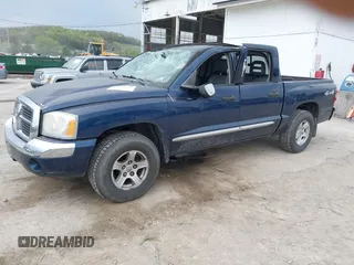 2005 Dodge Dakota Laramie with VIN 1D7HW58NX5S227633, listed as a IAAI auction lot 42122619 with 85,338 mi miles and . Bid and sale history available at DreamBid. Image 2.