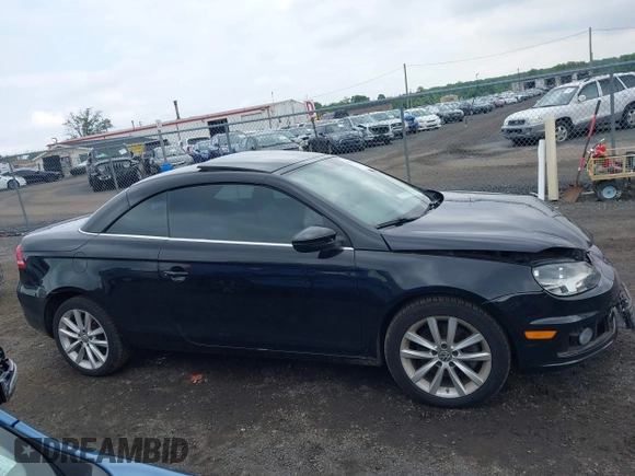 2014 Volkswagen Eos Sport with VIN WVWBW8AH2EV003356, listed as a IAAI auction lot 42394312 with 70,448 mi miles and . Bid and sale history available at DreamBid. Image 14.