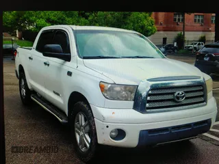 2009 Toyota Tundra Limited z VIN 5TFDW58169X093489, wystawiony jako IAAI lot #42396402 z przebiegiem 210 826 mil mil oraz . Historia ofert i sprzedaży dostępna na DreamBid. Obrazek 1.
