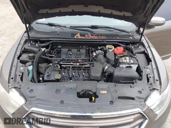 2015 Ford Taurus Limited with VIN 1FAHP2J84FG110702, listed as a IAAI auction lot 42060437 with 208,012 mi miles. Bid and sale history available at carsss.com. Image 10.