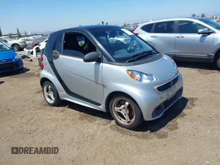 2013 Smart fortwo Pure with VIN WMEEJ3BA8DK619600, listed as a IAAI auction lot 42660006 with Not provided miles and . Bid and sale history available at DreamBid. Image 1.
