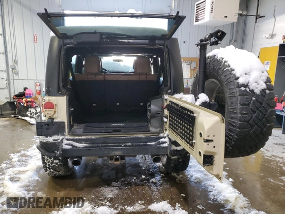 2012 Jeep Wrangler Unlimited Call of Duty MW3 with VIN 1C4BJWFGXCL105130, listed as a Copart auction lot 85747614 with 77,953 mi miles and Salvage title. Bid and sale history available at DreamBid. Image 6.