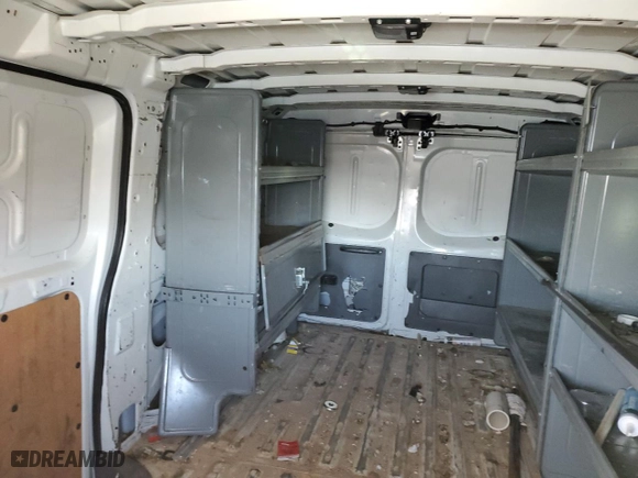 2015 Nissan NV SV with VIN 1N6BF0KX7FN803043, listed as a Copart auction lot 54079715 with 101,065 mi miles and Salvage Title. Bid and sale history available at carsss.com. Image 10.