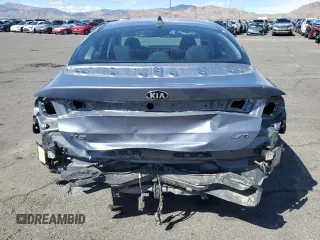 2021 Kia K5 LXS with VIN 5XXG14J21MG019101, listed as a Copart auction lot 49083215 with 76,070 mi miles and Salvage Title. Bid and sale history available at carsss.com. Image 6.