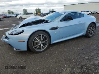 2015 Aston Martin Vantage z VIN SCFEKBAK2FGC19462, wystawiony jako Copart lot #61093934 z przebiegiem 53 068 mil mil oraz Szkoda całkowita • Salvage title. Historia ofert i sprzedaży dostępna na DreamBid. Obrazek 1.