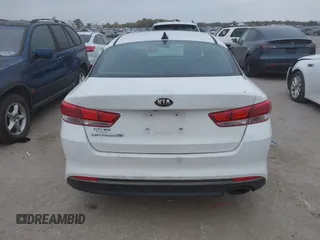 2016 Kia Optima LX with VIN KNAGT4L39G5104726, listed as a IAAI auction lot 40950914 with 128,728 mi miles. Bid and sale history available at carsss.com. Image 16.