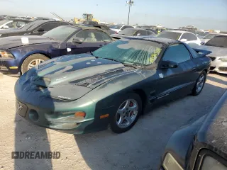 2000 Pontiac Firebird Formula z VIN 2G2FV22G2Y2160915, wystawiony jako Copart lot #76196454 z przebiegiem Nie podano mil oraz Czysty tytuł • Clean title. Historia ofert i sprzedaży dostępna na DreamBid. Obrazek 1.