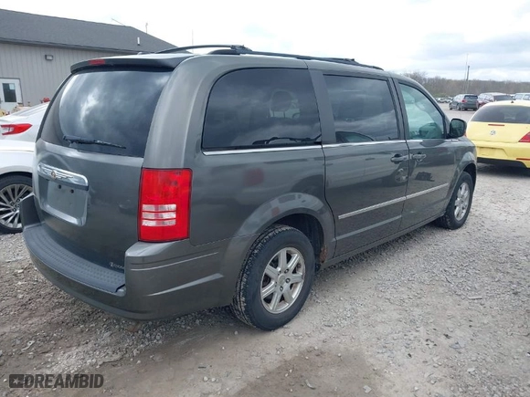 2010 Chrysler Town & Country Touring with VIN 2A4RR5D11AR194116, listed as a IAAI auction lot 42025043 with 197,826 mi miles. Bid and sale history available at carsss.com. Image 4.
