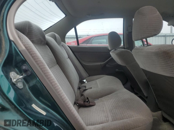 1999 Honda Civic VP z VIN 2HGEJ6619XH585514, wystawiony jako Copart lot #55683885 z przebiegiem 76 596 mil mil oraz Szkoda całkowita • Salvage title. Historia ofert i sprzedaży dostępna na DreamBid. Obrazek 10.