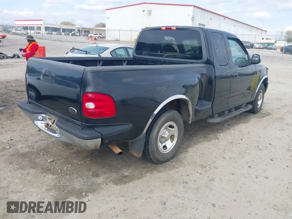 2000 Ford F-150 XL with VIN 1FTZX0725YKA09559, listed as a IAAI auction lot 41810954 with Not provided miles and . Bid and sale history available at DreamBid. Image 4.