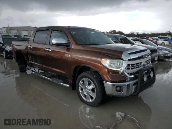 2015 Toyota Tundra 4WD Truck Platinum with VIN 5TFAW5F15FX451909, listed as a Copart auction lot 71782694 with 229,647 mi miles and Salvage Title. Bid and sale history available at carsss.com. Image 4.