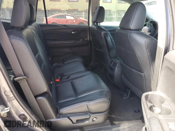 2019 Honda Pilot EX-L z VIN 5FNYF5H51KB042356, wystawiony jako Copart lot #57775565 z przebiegiem Nie podano mil oraz Nie do naprawy • Non repairable. Historia ofert i sprzedaży dostępna na DreamBid. Obrazek 11.