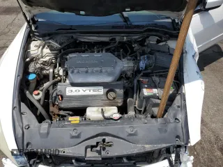 2003 Honda Accord EX z VIN 1HGCM66553A034197, wystawiony jako Copart lot #59805425 z przebiegiem 238 447 mil mil oraz Nie do naprawy • Non repairable. Historia ofert i sprzedaży dostępna na DreamBid. Obrazek 11.