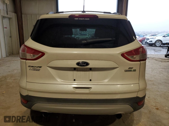 2013 Ford Escape SE z VIN 1FMCU0GX6DUC13677, wystawiony jako Copart lot #44182215 z przebiegiem 96 623 mil mil oraz Szkoda całkowita • Salvage title. Historia ofert i sprzedaży dostępna na DreamBid. Obrazek 6.