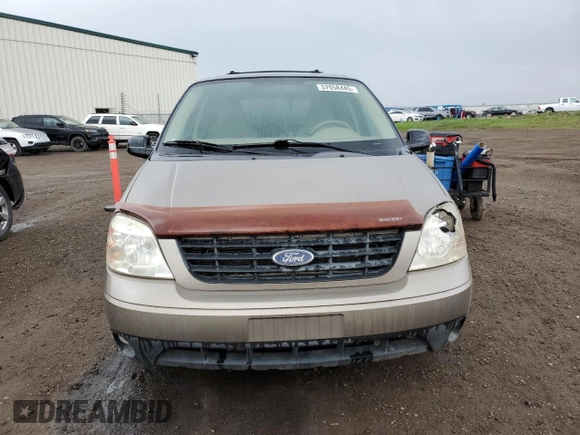 2005 Ford Freestar z VIN 2FMDA57275BA59115, wystawiony jako Copart lot #57058445 z przebiegiem 100 831 mil mil oraz Szkoda całkowita • Salvage title. Historia ofert i sprzedaży dostępna na DreamBid. Obrazek 5.