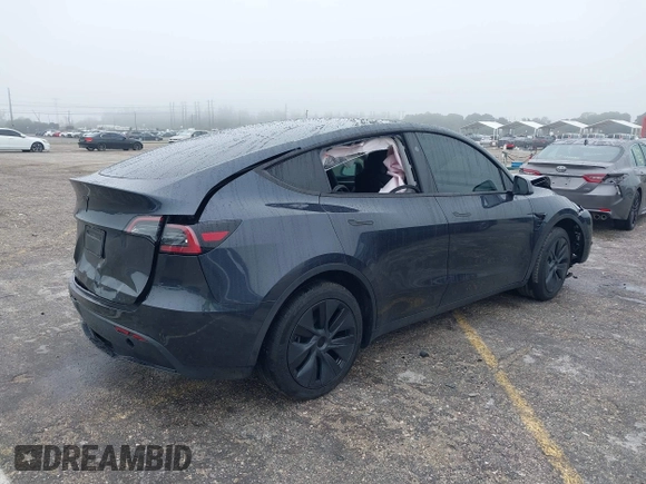 2024 Tesla Model Y with VIN 7SAYGDED8RF213927, listed as a IAAI auction lot 41386687 with 3,599 mi miles and . Bid and sale history available at DreamBid. Image 4.