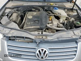 2004 Volkswagen Passat GLS z VIN WVWPD63B04P325358, wystawiony jako Copart lot #57180485 z przebiegiem 195 553 mil mil oraz Czysty tytuł • Clean title. Historia ofert i sprzedaży dostępna na DreamBid. Obrazek 11.