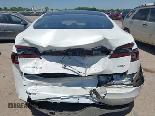 2017 Tesla Model S 100D with VIN 5YJSA1E20HF232570, listed as a IAAI auction lot 42037409 with 68,957 mi miles and . Bid and sale history available at DreamBid. Image 16.