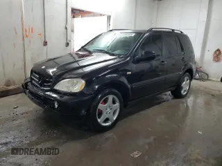2000 Mercedes-Benz M-Class AMG with VIN 4JGAB74EXYA219143, listed as a Copart auction lot 71922634 with 156,092 mi miles and Salvage Title. Bid and sale history available at carsss.com. Image 1.