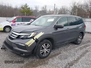 2017 Honda Pilot EX-L with VIN 5FNYF6H59HB029160, listed as a IAAI auction lot 41557192 with 157,153 mi miles and . Bid and sale history available at DreamBid. Image 18.