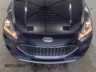 2021 Ford Escape SE Hybrid z VIN 1FMCU9BZ3MUA52539, wystawiony jako IAAI lot #42437654 z przebiegiem 59 148 mil mil oraz . Historia ofert i sprzedaży dostępna na DreamBid. Obrazek 24.