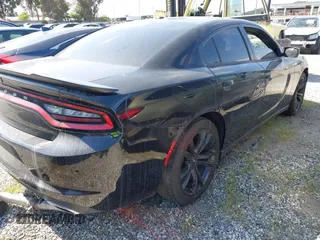 2018 Dodge Charger SXT with VIN 2C3CDXBG3JH297674, listed as a IAAI auction lot 41398621 with 125,458 mi miles and . Bid and sale history available at DreamBid. Image 4.