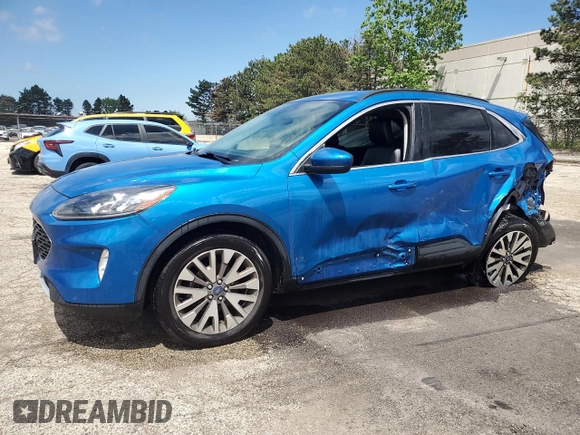 2021 Ford Escape Titanium с VIN 1FMCU9J90MUA58591, выставлен на аукционе Copart как лот 57126875 с пробегом 109 483 миль миль и Списание • Salvage title. История ставок и продаж доступна на DreamBid. Изображение 1.