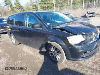2014 Dodge Grand Caravan SXT with VIN 2C4RDGCG4ER337202, listed as a IAAI auction lot 40781755 with 258,524 mi miles and . Bid and sale history available at DreamBid. Image 1.