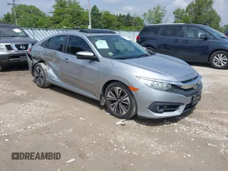 2016 Honda Civic EX-T with VIN 19XFC1F32GE004058, listed as a IAAI auction lot 42367564 with 117,343 mi miles and . Bid and sale history available at DreamBid. Image 1.