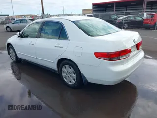 2004 Honda Accord LX with VIN JHMCM56344C005690, listed as a IAAI auction lot 41360785 with 132,915 mi miles and . Bid and sale history available at DreamBid. Image 3.