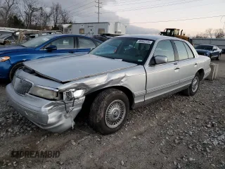 1996 Mercury Grand Marquis GS with VIN 2MELM74W8TX653415, listed as a Copart auction lot 85582734 with 187,282 mi miles and Salvage Title. Bid and sale history available at DreamBid. Image 1.