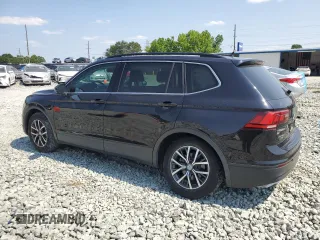 2019 Volkswagen Tiguan SE with VIN 3VV3B7AX9KM012693, listed as a Copart auction lot 59565615 with 137,276 mi miles and Salvage title. Bid and sale history available at DreamBid. Image 2.