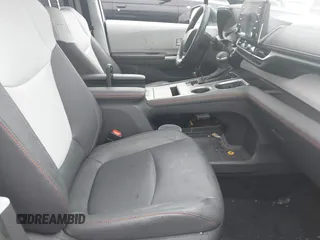 2023 Toyota Sienna XSE with VIN 5TDDSKFC8PS106342, listed as a IAAI auction lot 42290000 with 13,420 mi miles and . Bid and sale history available at DreamBid. Image 5.