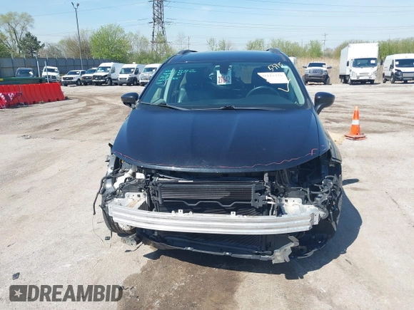 2018 Chrysler Pacifica Touring L z VIN 2C4RC1BG6JR253880, wystawiony jako IAAI lot #42115375 z przebiegiem 98 551 mil mil oraz . Historia ofert i sprzedaży dostępna na DreamBid. Obrazek 13.