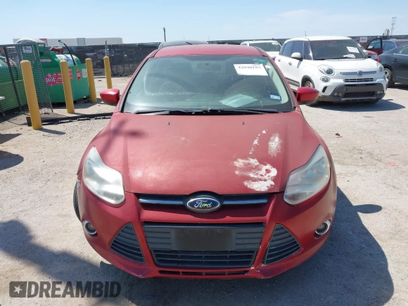 2012 Ford Focus SE z VIN 1FAHP3F21CL428659, wystawiony jako IAAI lot #42040183 z przebiegiem 195 947 mil mil oraz . Historia ofert i sprzedaży dostępna na DreamBid. Obrazek 6.