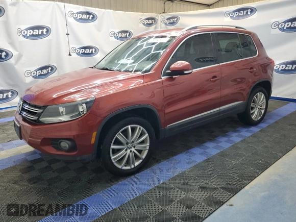 2012 Volkswagen Tiguan SE z VIN WVGAV7AX9CW002143, wystawiony jako Copart lot #55820395 z przebiegiem 174 356 mil mil oraz Czysty tytuł • Clean title. Historia ofert i sprzedaży dostępna na DreamBid. Obrazek 1.
