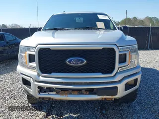 2019 Ford F-150 XL with VIN 1FTEW1EPXKKE73220, listed as a IAAI auction lot 41786592 with 118,410 mi miles and . Bid and sale history available at carsss.com. Image 6.
