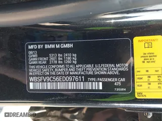 2014 BMW M5 with VIN WBSFV9C56ED097611, listed as a IAAI auction lot 41845196 with 72,215 mi miles. Bid and sale history available at carsss.com. Image 9.