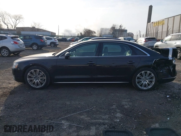 2015 Audi A8 3.0T with VIN WAU3GAFDXFN028244, listed as a IAAI auction lot 41791578 with 149,770 mi miles and . Bid and sale history available at DreamBid. Image 14.