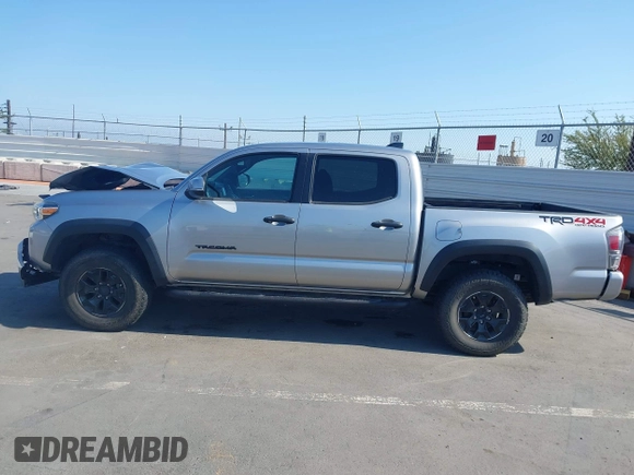 2021 Toyota Tacoma SR with VIN 5TFCZ5AN6MX270972, listed as a IAAI auction lot 42460823 with 76,062 mi miles and . Bid and sale history available at DreamBid. Image 15.