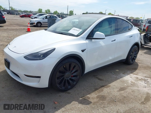 2021 Tesla Model Y Performance z VIN 5YJYGDEF7MF277769, wystawiony jako IAAI lot #42025157 z przebiegiem 28 522 mil mil oraz . Historia ofert i sprzedaży dostępna na DreamBid. Obrazek 18.