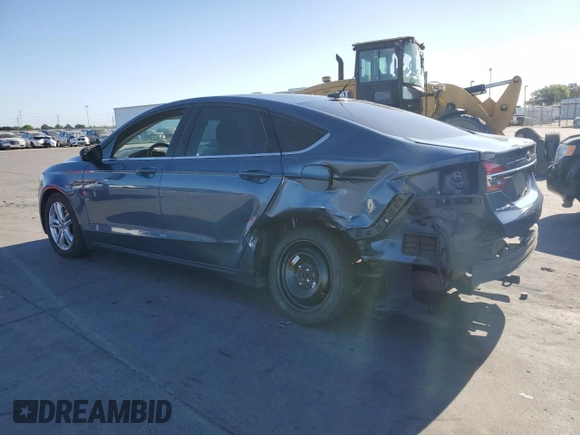 2018 Ford Fusion SE z VIN 3FA6P0H7XJR110391, wystawiony jako Copart lot #58069735 z przebiegiem 168 222 mil mil oraz Szkoda całkowita • Salvage title. Historia ofert i sprzedaży dostępna na DreamBid. Obrazek 2.