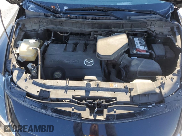 2015 Mazda CX-9 Sport с VIN JM3TB2BA4F0450064, выставлен на аукционе Copart как лот 86707144 с пробегом 163 743 миль миль и Списание • Salvage title. История ставок и продаж доступна на DreamBid. Изображение 12.