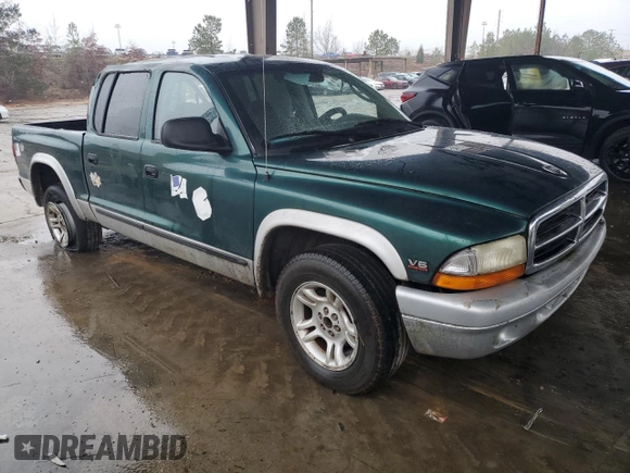 2003 Dodge Dakota SLT with VIN 1D7HL48X03S261436, listed as a Copart auction lot 42317965 with 136,380 mi miles and Salvage Title. Bid and sale history available at carsss.com. Image 4.
