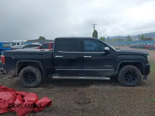 2017 GMC Sierra 1500 Denali z VIN 3GTU2PEJXHG304823, wystawiony jako IAAI lot #42293712 z przebiegiem 185 809 mil mil oraz . Historia ofert i sprzedaży dostępna na DreamBid. Obrazek 13.
