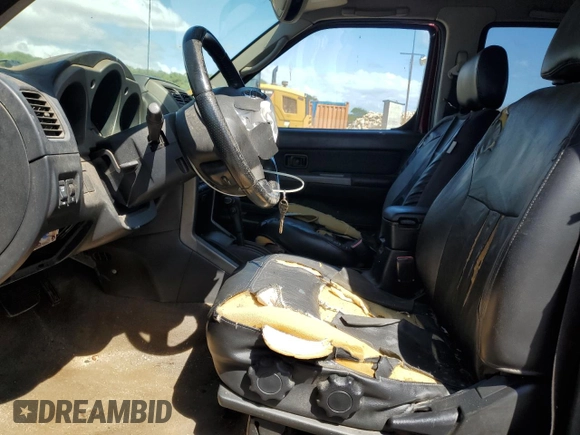 2004 Nissan Frontier XE with VIN 1N6ED29XX4C433431, listed as a Copart auction lot 48961885 with 199,673 mi miles and Salvage title. Bid and sale history available at DreamBid. Image 7.