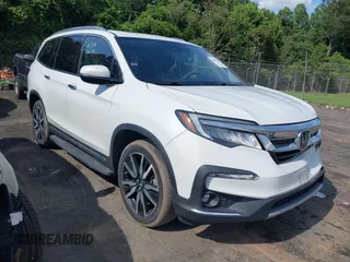 2021 Honda Pilot Touring 8-Passenger with VIN 5FNYF6H95MB091006, listed as a IAAI auction lot 42509101 with 43,879 mi miles and . Bid and sale history available at DreamBid. Image 1.