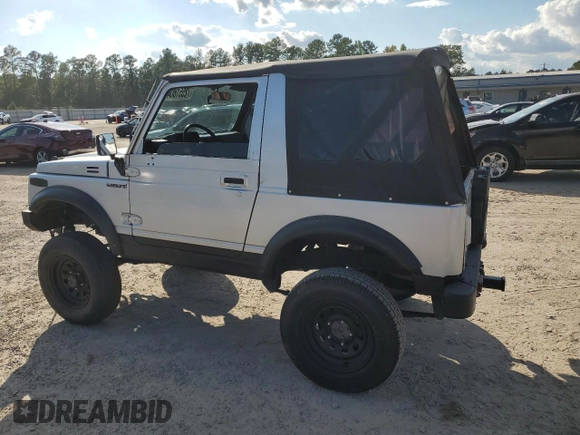 1987 Suzuki Samurai z VIN JS3JC51C3H4186141, wystawiony jako Copart lot #72551804 z przebiegiem 525 030 mil mil oraz Szkoda całkowita • Salvage title. Historia ofert i sprzedaży dostępna na DreamBid. Obrazek 2.