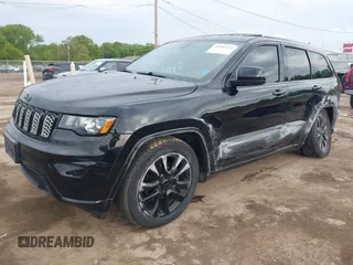 2018 Jeep Grand Cherokee Altitude with VIN 1C4RJFAG0JC420683, listed as a IAAI auction lot 42365727 with 148,730 mi miles and . Bid and sale history available at DreamBid. Image 2.