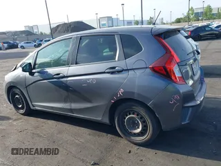 2015 Honda Fit LX z VIN 3HGGK5H51FM774707, wystawiony jako IAAI lot #42228746 z przebiegiem 238 489 mil mil oraz . Historia ofert i sprzedaży dostępna na DreamBid. Obrazek 15.